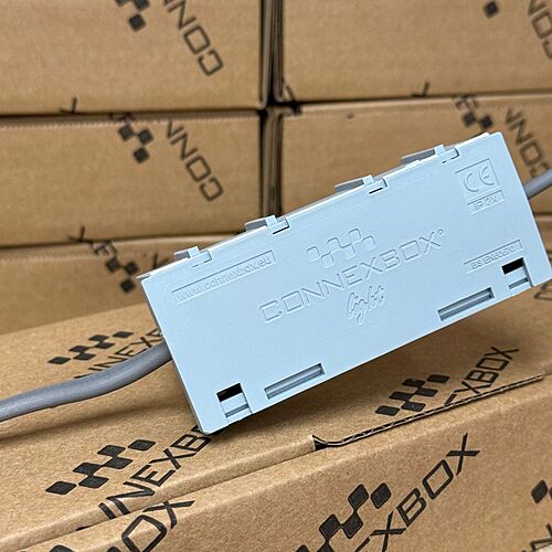 Connexbox Light enclosure displayed on Connexbox branded packaging